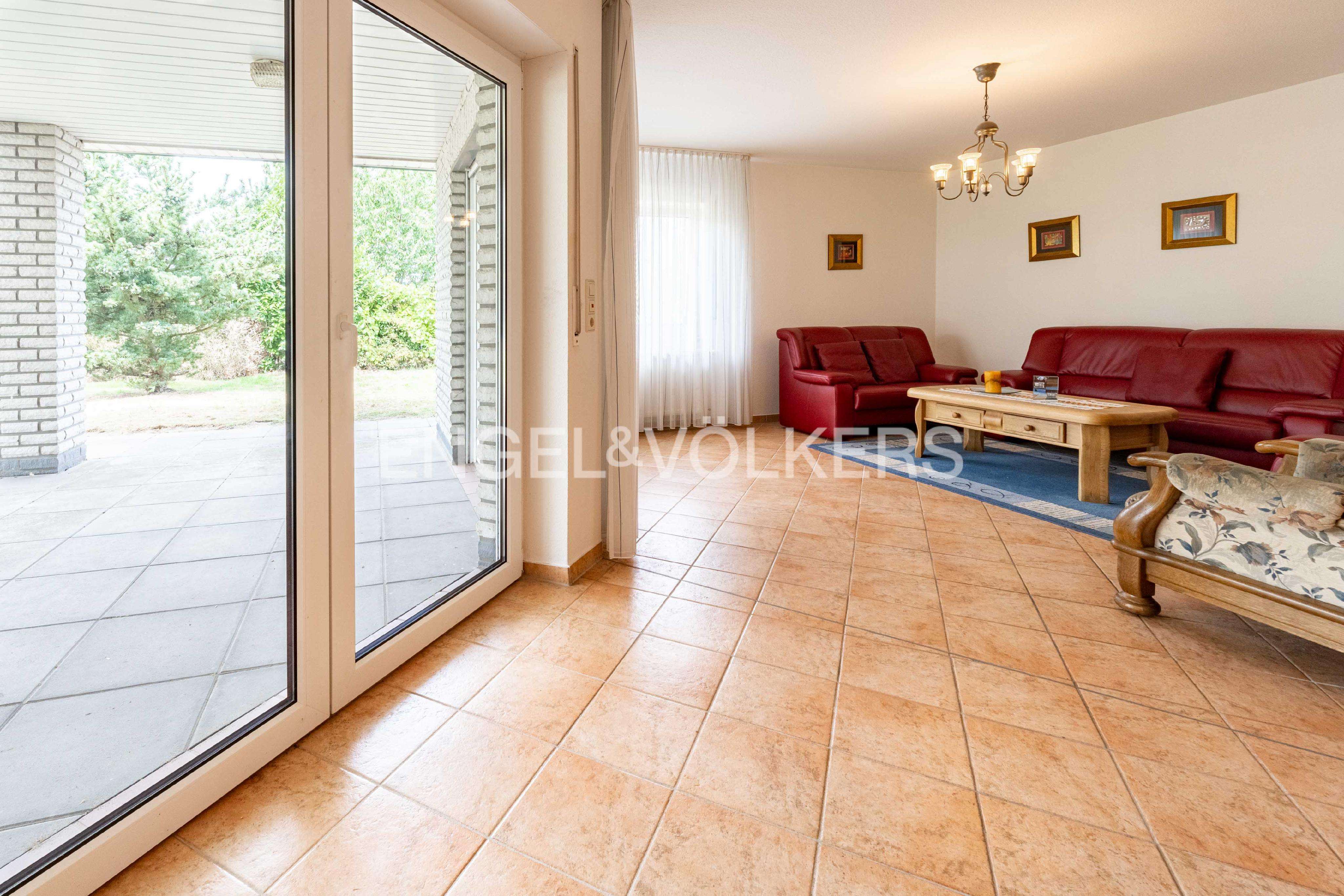 Immobilie in Lünne - Bungalow mit überdachter Terrasse, Werkstatt & Ausbaureserve im Dachgeschoss - Bild 0