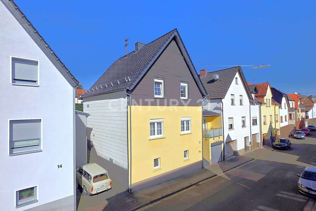 Immobilie in Quierschied - Attraktives Einfamilienhaus mit Balkon, Garage und Garten in ruhiger Wohnlage in Quierschied - Bild 2