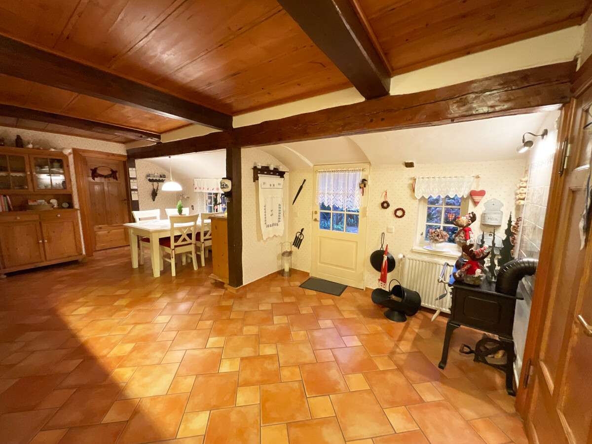 Immobilie in Risum-Lindholm - Reetdachkate mit historischem Flair & Gartenidylle vereint - Bild 5