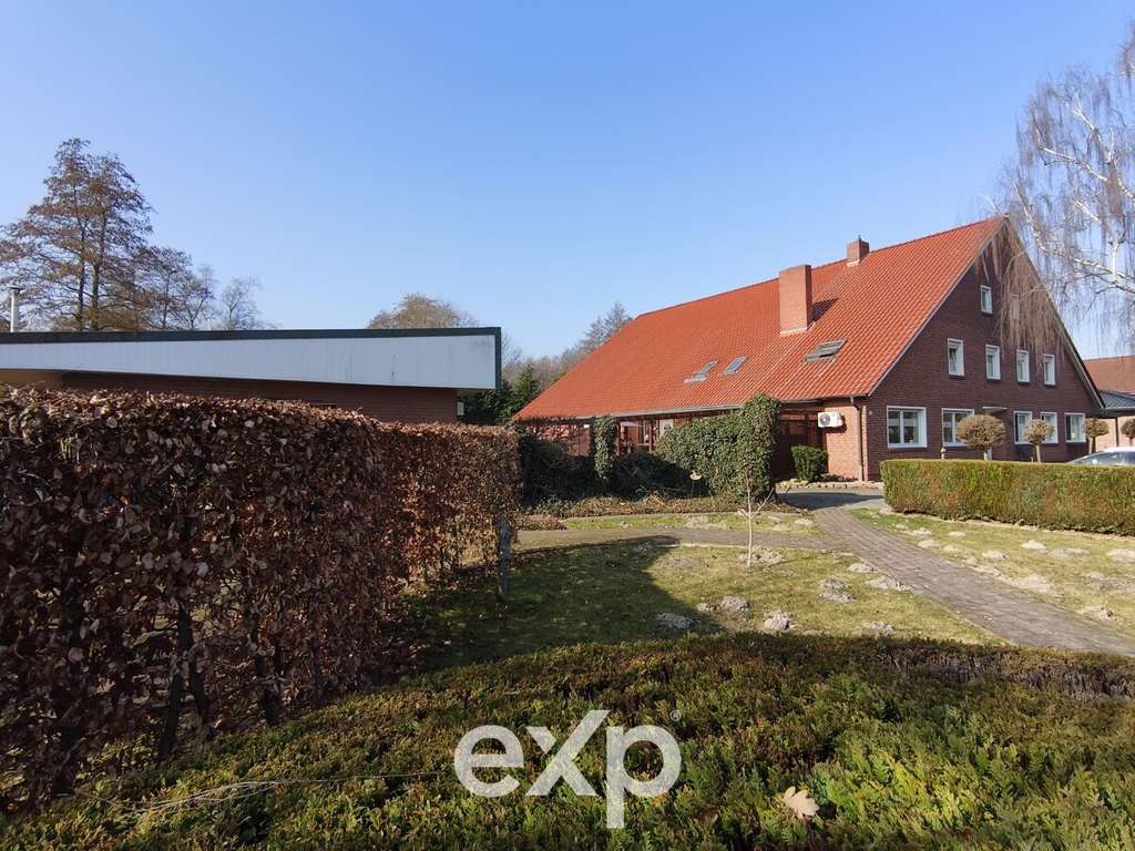 Immobilie in Surwold - Exklusive Gelegenheit: Mehrparteienhaus mit drei Wohneinheiten auf großem Grundstück in Surwold - Bild 2