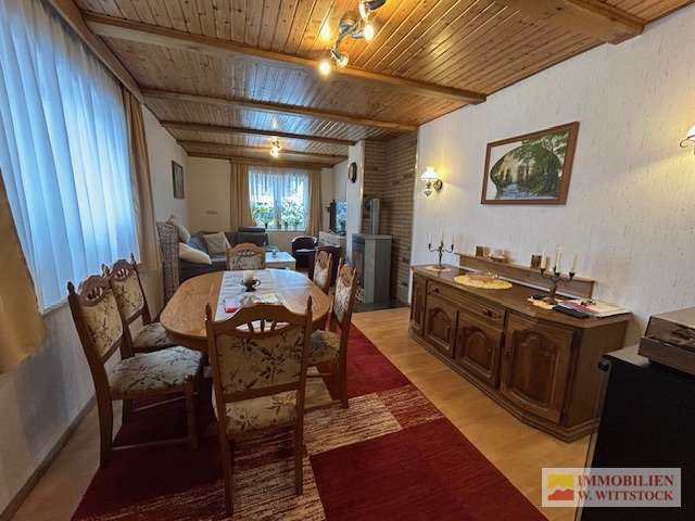 Immobilie in Putlitz - Gepflegtes Grundstück mit gemütlichen EFH, Carport, Werkstatt und Partyraum in ruhiger Dorflage - Bild 1