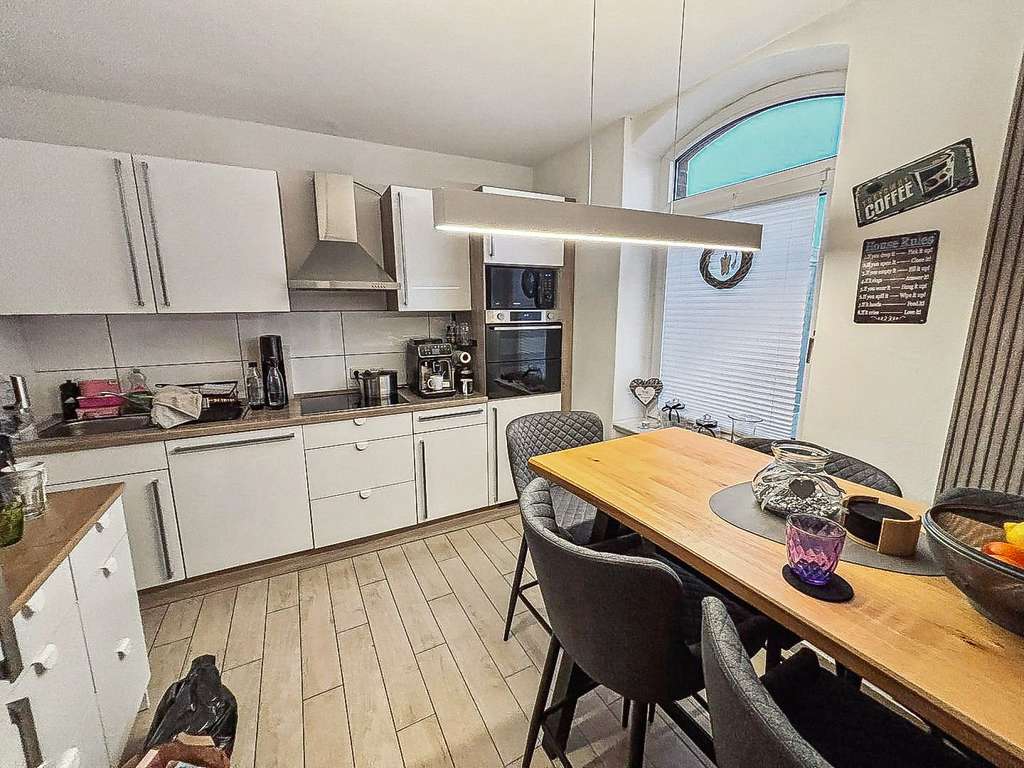 Immobilie in Giesen - Gepflegtes Mehrfamilienhaus mit 3 Wohneinheiten in guter und zentraler Lage von Giesen-Hasede - Bild 4