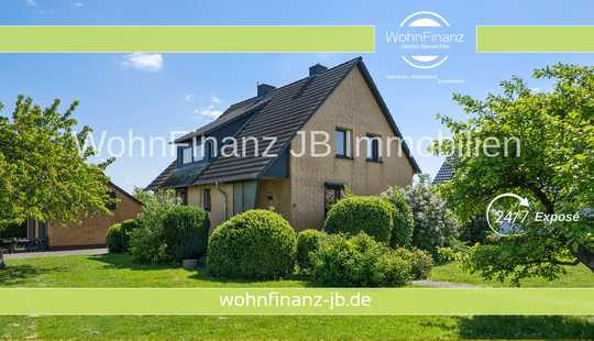 Bild von Einfamilienhaus mit Einliegerwohnung, großzügigem Garten und 2 Garagen