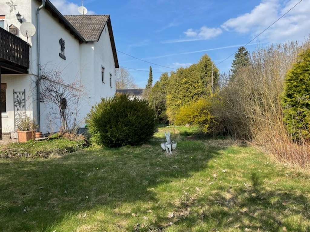 Immobilie in Ismaning - Rarität in Ismaning: Doppelhaushälfte auf 850 m² Traumgrundstück mit Potenzial - Bild 2