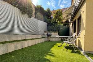 Provisionsfrei: 4-Zi.-EG-Wohnung mit 80 m² Garten,  Klima, Tiefgarage & Hobbyraum