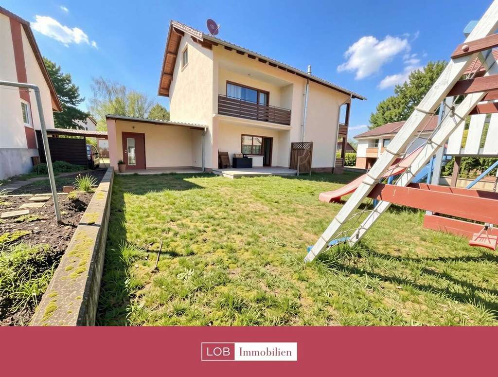 Immobilie in Gau-Bickelheim - Familienfreundlich & modern – Haus mit großem Sonnengarten - Bild 1