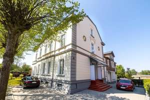 Stilvolle Etagenwohnung in denkmalgeschützter Fabrikantenvilla – Wohnen mit Charakter