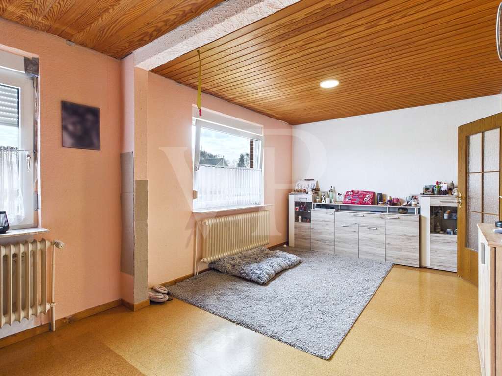 Immobilie in Ihlow - Charmantes Landhaus mit Wirtschaftsteil, Garage und großem Garten in Ihlow-Simonswolde - Bild 2