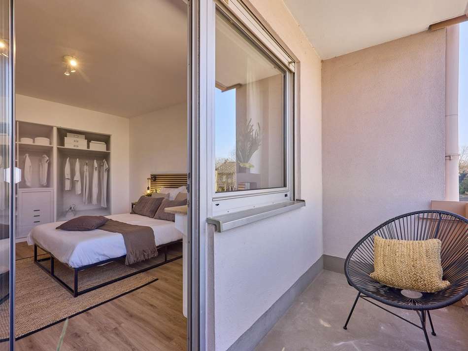 Schlafzimmer mit Balkon