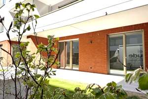 KFW55, exklusive  Wohnung mit Garten, zwei großen Terrassen, Fernwärme und Tiefgarage