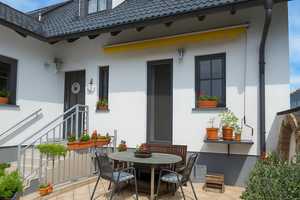 Familienfreundlich wohnen in Philippsburg –  Einfamilienhaus mit Garage, Carport & idyllischem Hof – Karlsruhe (Kreis) – Vorschaubild 2