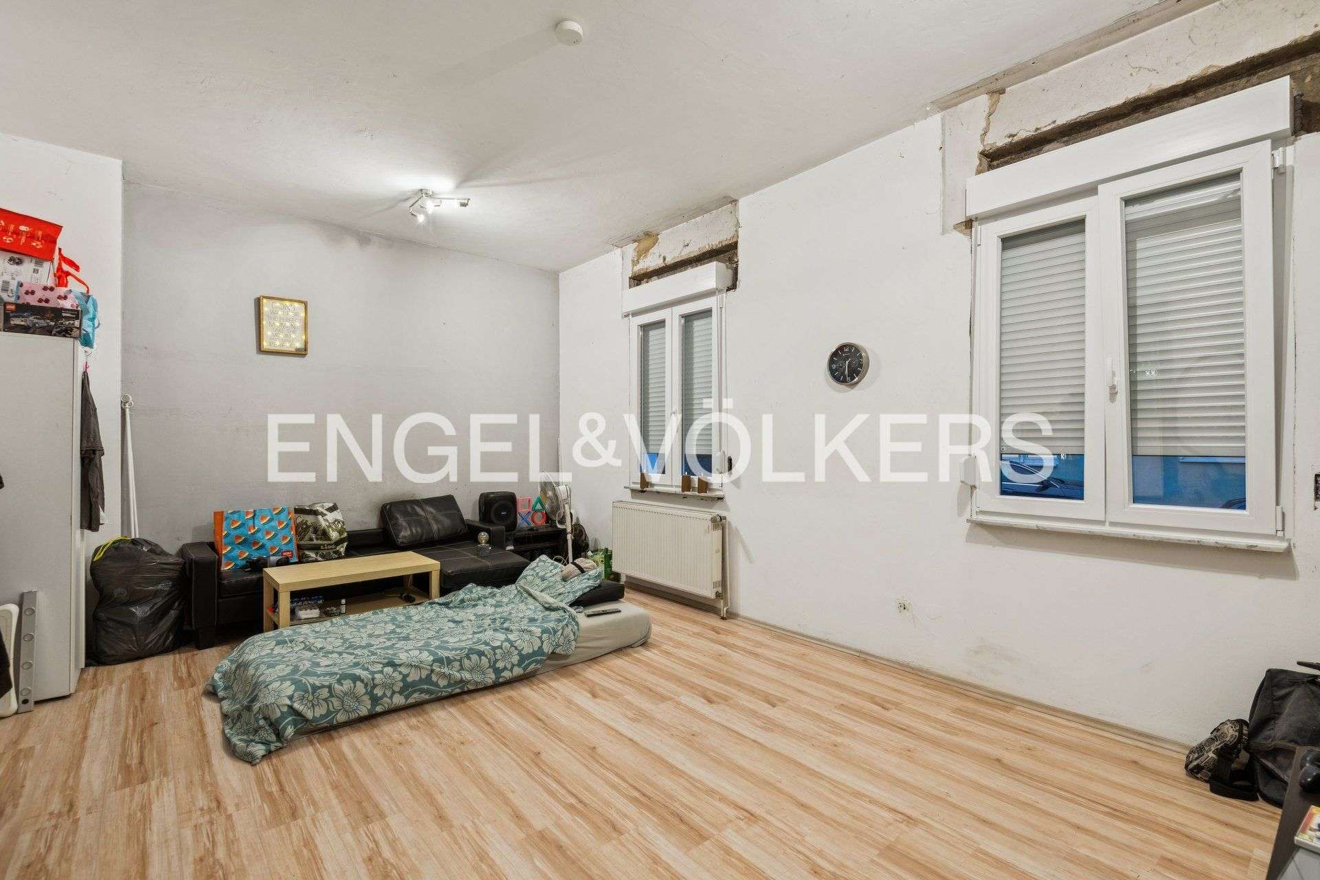 Immobilie in Ginsheim-Gustavsburg - Gepflegtes Dreifamilienhaus – Eigennutzung oder Kapitalanlage mit 5,2 % Rendite - Bild 1