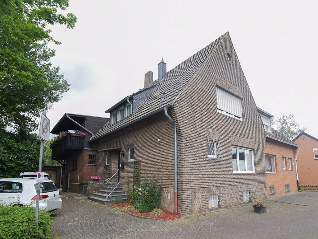 Immobilie in Korschenbroich - Frei werdendes und stilvolles Einfamilienhaus mit Loft-Charakter und Stellplätzen - Bild 1