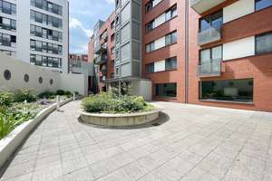 Charmante 2-Zimmer-Erdgeschosswohnung mit großer Südterrasse und Tiefgaragenstellplatz im Pelikanv
