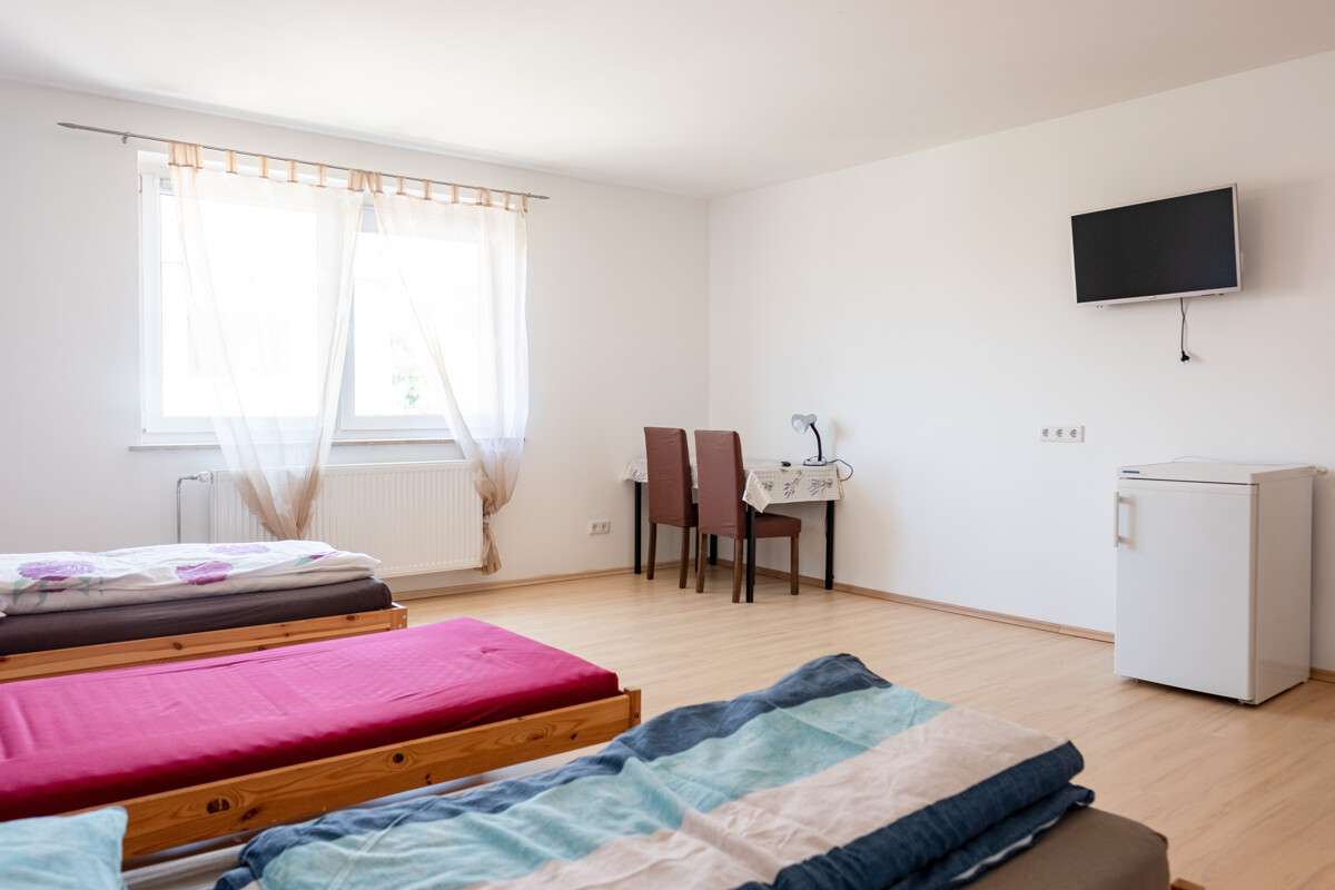 Immobilie in Aiterhofen - Viel Platz, klare Struktur – renditestarkes Mehrfamilienhaus in Aiterhofen - Bild 6