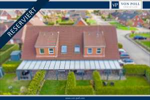 Küstenflair und Gemütlichkeit: Charmantes Reihenmittelhaus mit Terrasse und Garten in Dornumersiel – Aurich (Kreis) – Vorschaubild 1