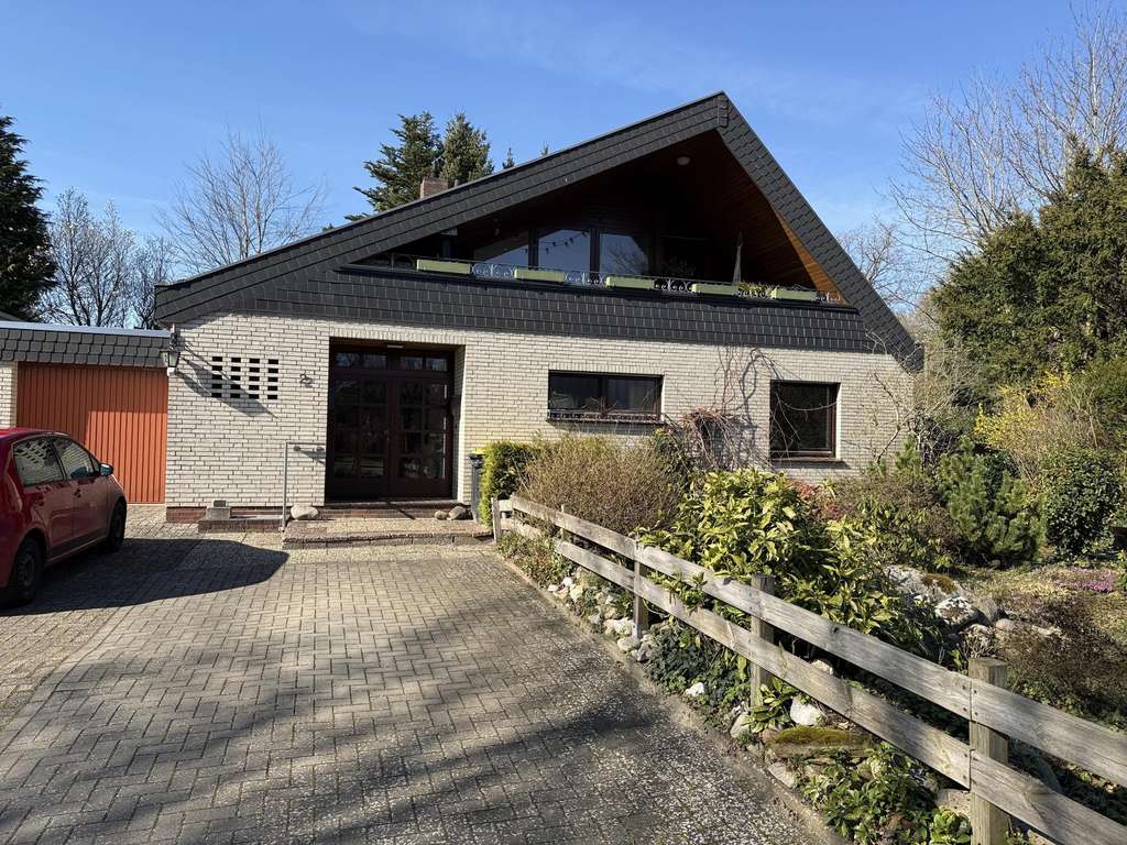 Immobilie in Wardenburg - Einfamilienhaus mit Einliegerwohnung in attraktiver Wohnlage  - Bild 0