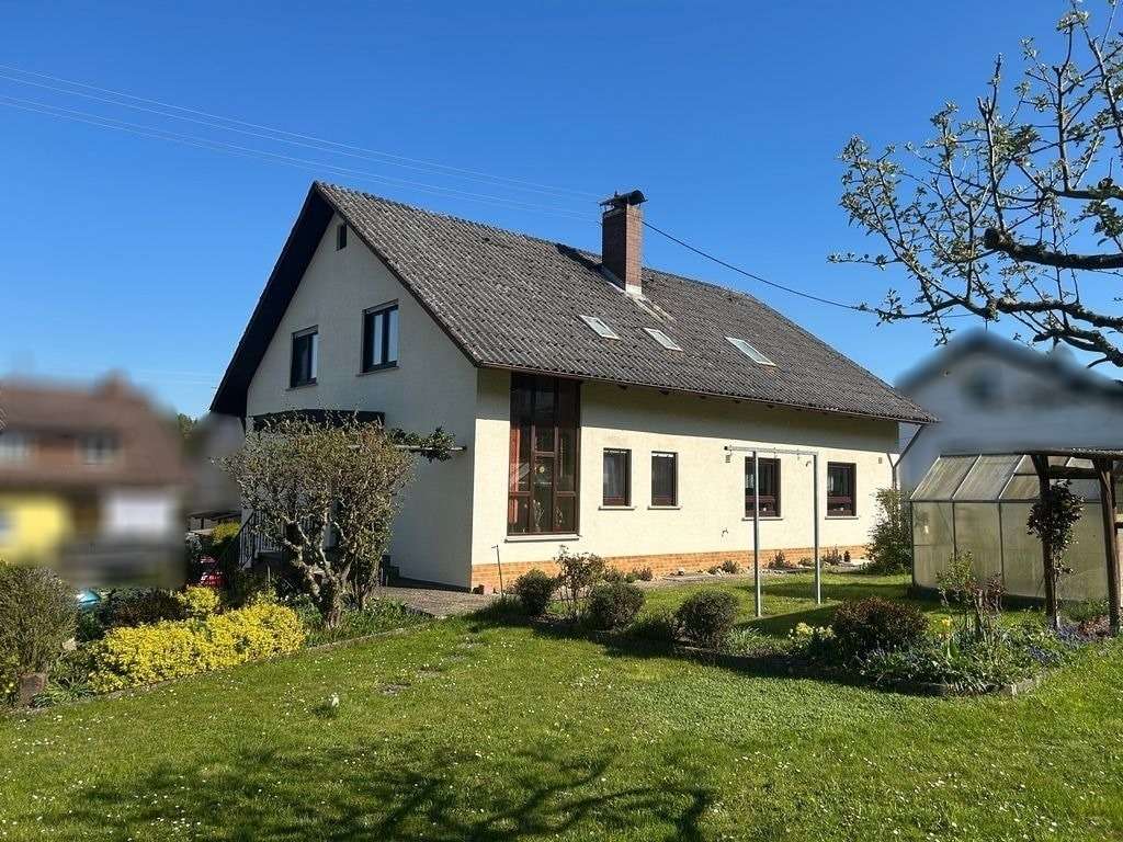 Immobilie in Buchen (Odenwald) - Ankommen, entfalten, genießen – Ihr neues Zuhause mit viel Platz für Familie & Leben - Bild 1