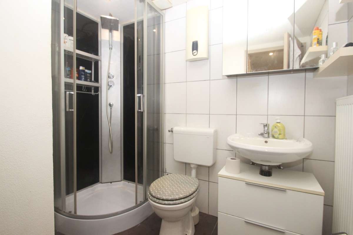 Immobilie in Königswinter - Wohnhaus mit 3 Mieteinheiten zentral in Königswinter-Thomasberg! - Bild 16