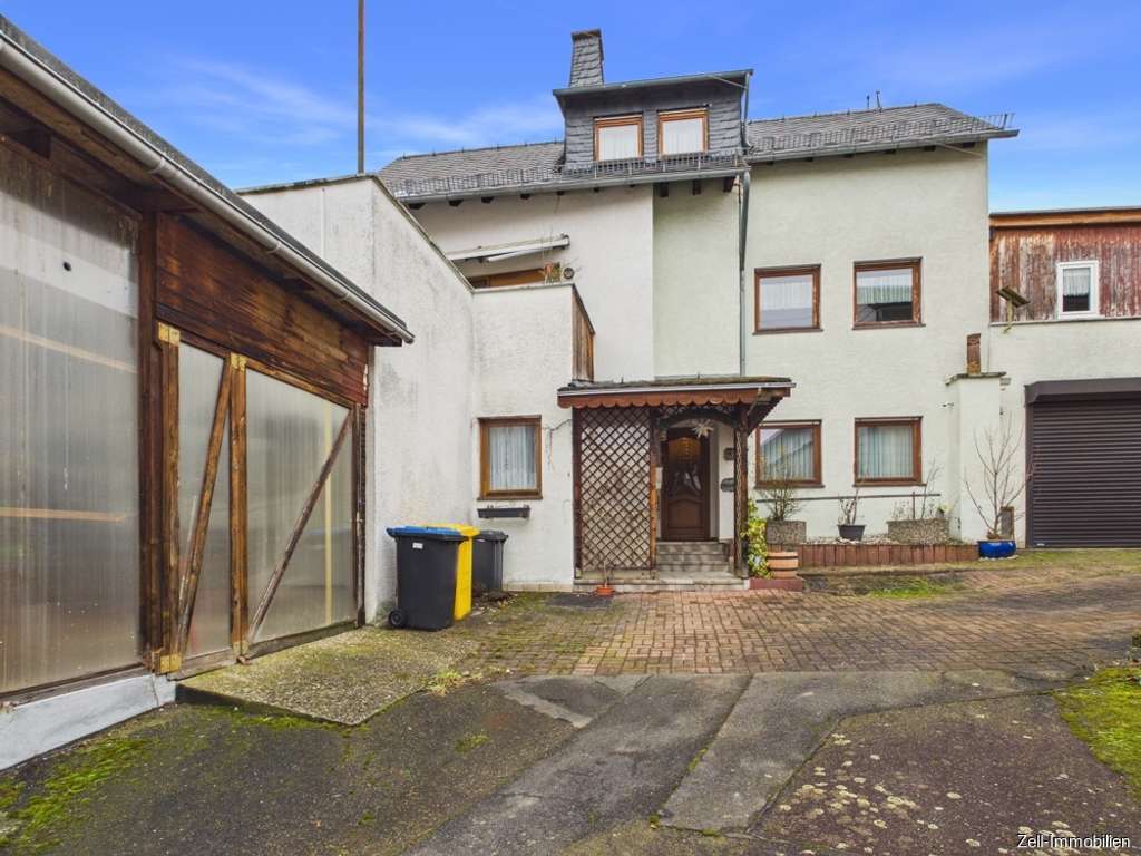 Immobilie in Bornich - Einfamilienhaus mit Garage, Werkstatt und Einliegerwohnung in Bornich zu verkaufen - Bild 2