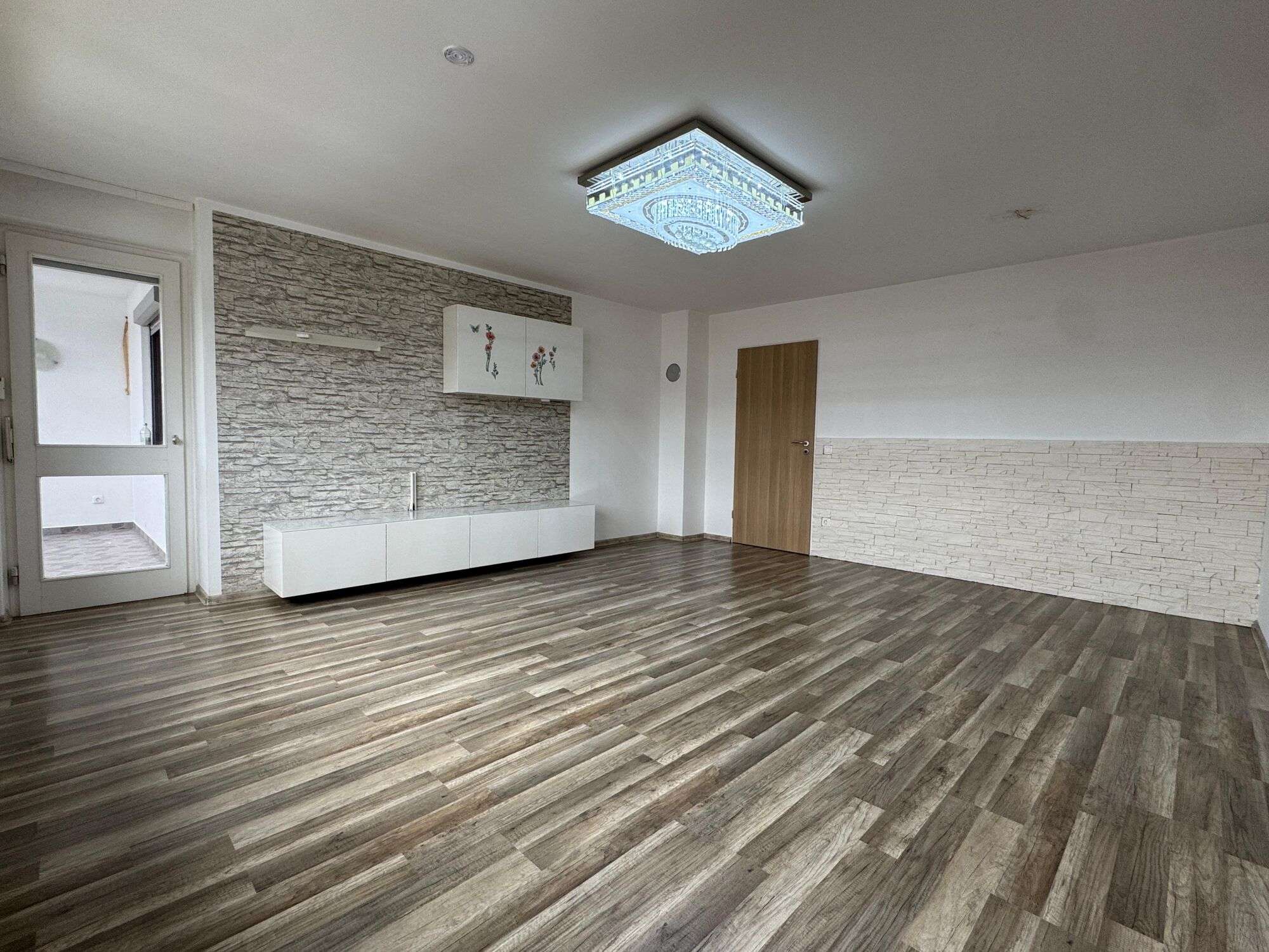 Immobilie in Trostberg - ***Attraktive Kapitalanlage: Vermietete 3-Zimmer-Wohnung mit Garage und Wintergarten*** - Bild 2