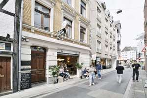Historisches Wohn- und Geschäftshaus im Ehrenstraßenviertel mit freier Dachterrassen-Maisonette