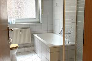 Zentrale 2,5-Zimmer-Wohnung mit eigenem Garten, Terrasse, Garage und Stellplatz in Neukirchen-Vluyn – Feldstraße 13a, 47506 Neukirchen-Vluyn – Vorschaubild 2