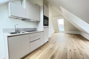 Dachgeschosswohnung mit Wohnküche und Fußbodenheizung