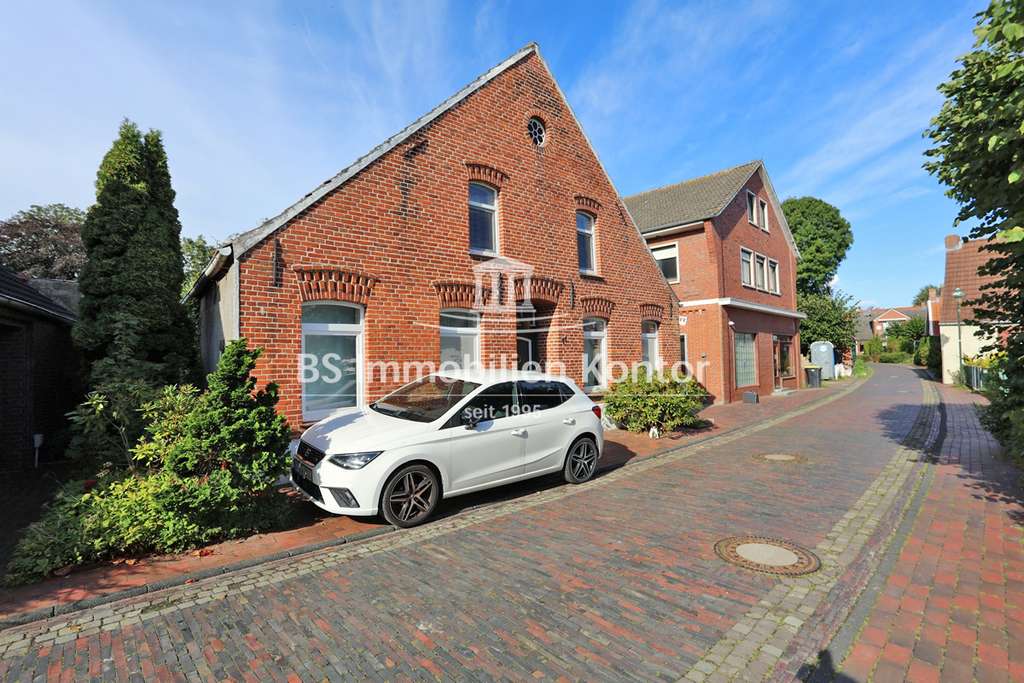 Immobilie in Krummhörn - Küstenregion! Gepflegtes Einfamilienhaus mit zwei Wohnungen und Terrasse! - Bild 1