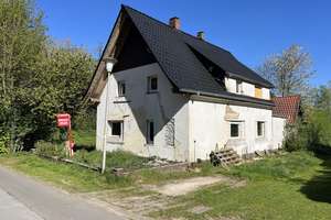 98.000€ - Keine Provision - Einfamilienhaus mit Anbau und 2833m2 großem Grundstück im Grünen gelegen – Neue Mühler Weg 4, 32361 Preußisch Oldendorf – Vorschaubild 2