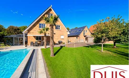 Exklusives Wohnerlebnis - Modernes EFH mit Wintergarten, Pool und nachhaltiger Energieversorgung!