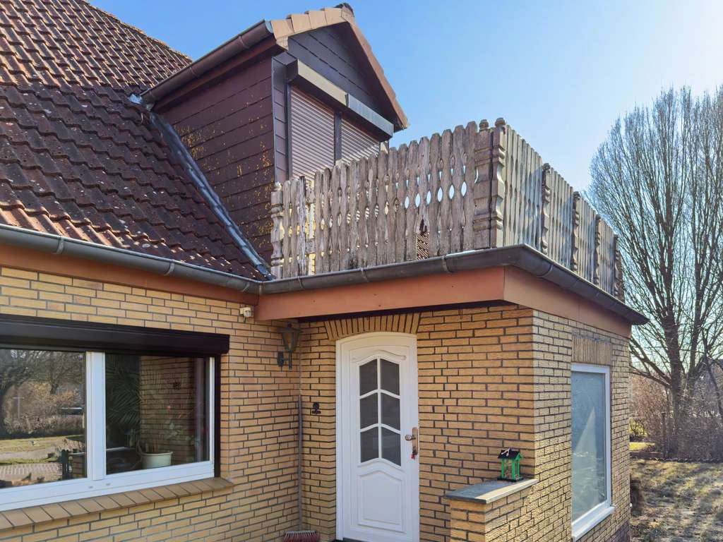 Immobilie in Eutin - Modernisierungschance: Doppelhaushälfte mit umlaufendem Garten - Bild 2