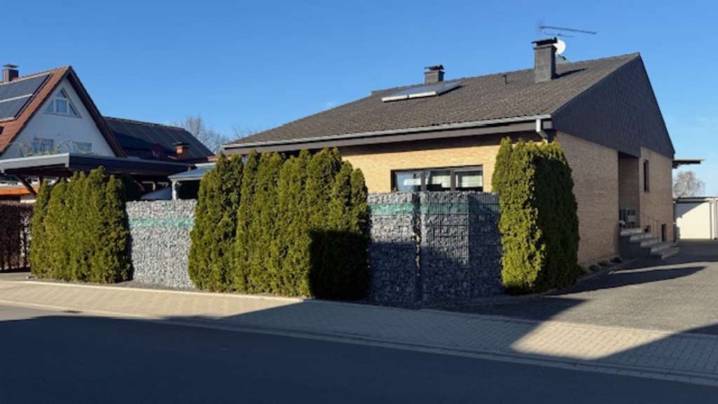 Immobilie in Rietberg - Für 2 Generationen.  
Gepflegtes Einfamilienhaus mit Einliegerwohnung. - Bild 2