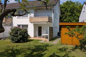 Neuwertig & Energieeffizient: 2-Zimmer-Wohnung mit EBK, Terrasse und eigenem Garten