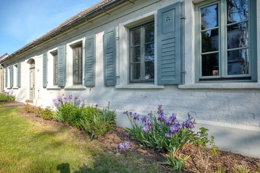 Immobilie in Vogelsang-Warsin - Historie trifft Komfort - ehem. Hof des Kahnschiffers: antike Öfen + Holzdielen 900m vom Haffstrand - Bild 1