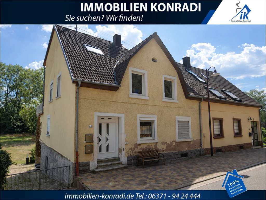 Immobilie in Nanzdietschweiler - IK | Nanzdietschweiler: Doppelhaushälfte mit herrlichem Naturblick und Rohbauwohnung im EG - Bild 0