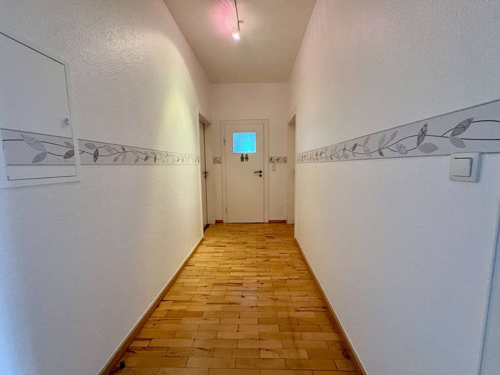 Immobilie in Stolzenau - Zweifamilienhaus mit einer Praxis, einer Wohneinheit und einem idyllischen Garten in Stolzenau! - Bild 3