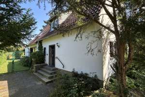 Ein.-Zweifamilienhaus mit Charme und Traumgarten
