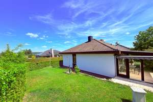 Familienbungalow mit Einliegerwohnung und Doppelgarage auf schönem Hanggrundstück – Katharinenberg 12, 91350 Gremsdorf – Vorschaubild 4