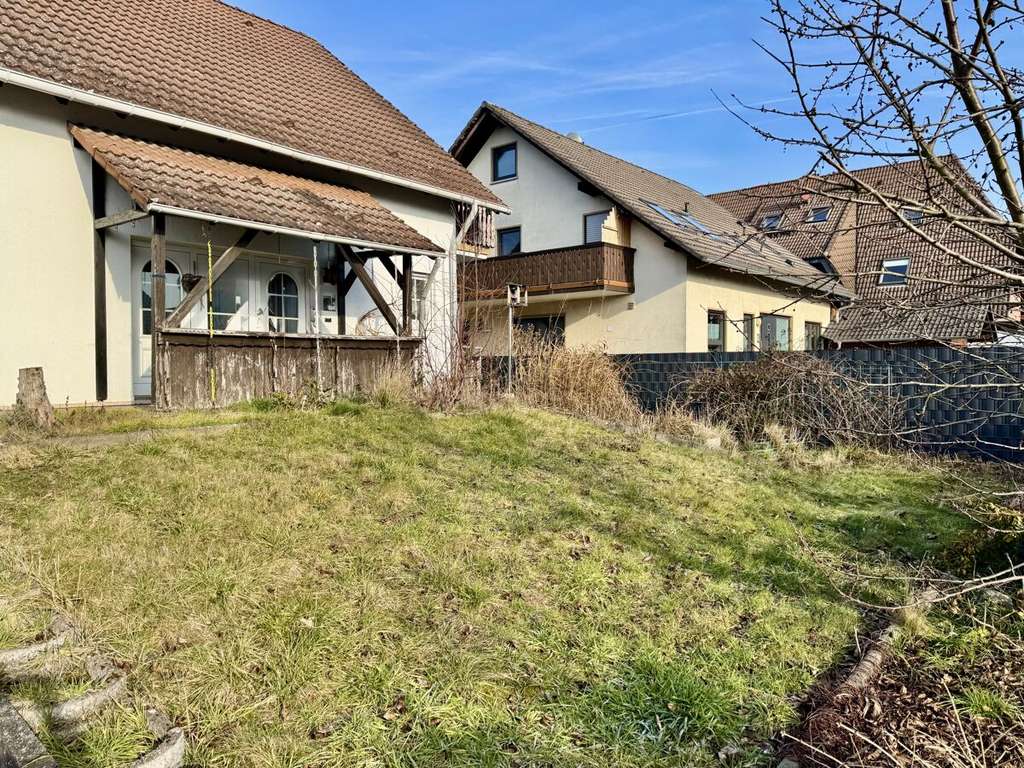 Immobilie in Münster (Hessen) - Freistehendes Einfamilienhaus mit
Einliegerwohnung, Garage & großer Terrasse - Bild 4