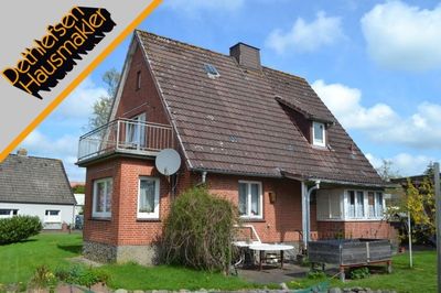 Einfamilienhaus auf schönem Grundstück mit altem Baumbestand in Lunden, Kreis Dithmarschen
