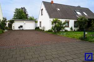 Charmante Doppelhaushälfte mit Wintergarten, großem Grundstück & viel Potenzial in Bremen – Die vollständige Adresse der Immobilie erhältst du vom Anbieter., 28307 Arbergen, Bremen – Vorschaubild 1