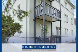 Erdgeschoss, aber *elevated* - vermietete Eigentumswohnung