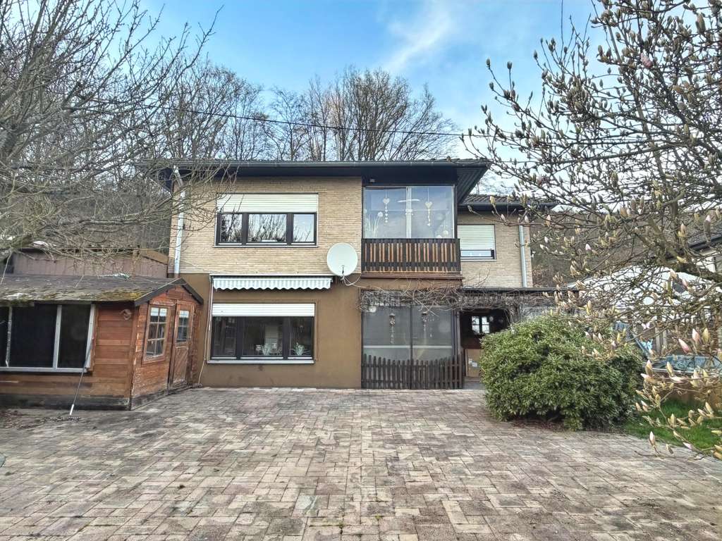 Immobilie in Obersteinebach - Solider vollunterkellerter Bungalow mit tollem Grundstück - Bild 2