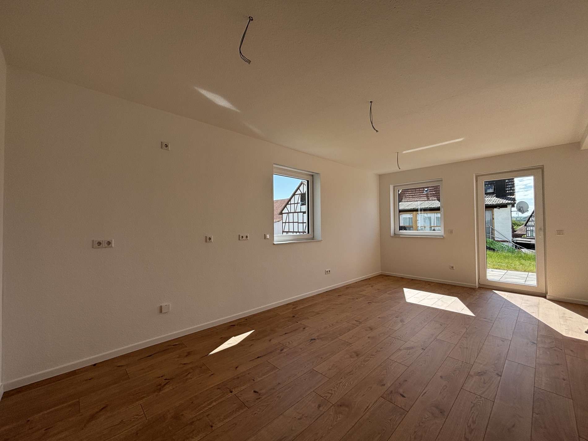 Immobilie in Weimar (Lahn) - Doppelhaushälfte mit Wohlfühlfaktor in Weimar-Niederwalgern! - Bild 2