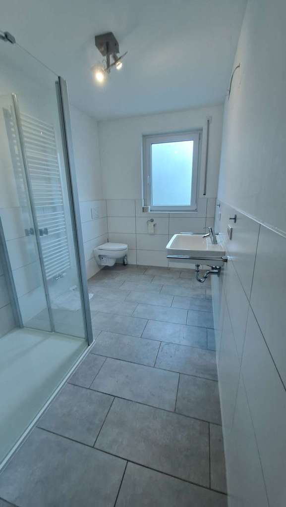 Immobilie in Großkrotzenburg - Zwei-Familienhaus mit Maisonette-Whg, Doppelgarage & Südgrundstück am Feld - Bild 2