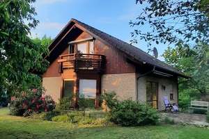 Charmantes freistehendes Einfamilienhaus mit einem Traumgarten und herrlichem Feldblick – 14612 Falkensee – Vorschaubild 1