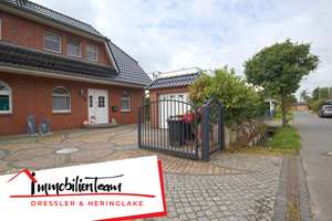 Feldrandlage von Halstenbek: Komfortable Doppelhaushälfte mit Garten, Garage und Ausbaupotenzial