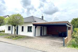 Einfamilienhaus im Bungalowstil – Stilvoll, ebenerdig und energieeffizient