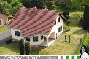 Mehr Freiraum: Einzugsbereites Einfamilienhaus mit parkähnlichem Freizeitgrundstück in Swisttal